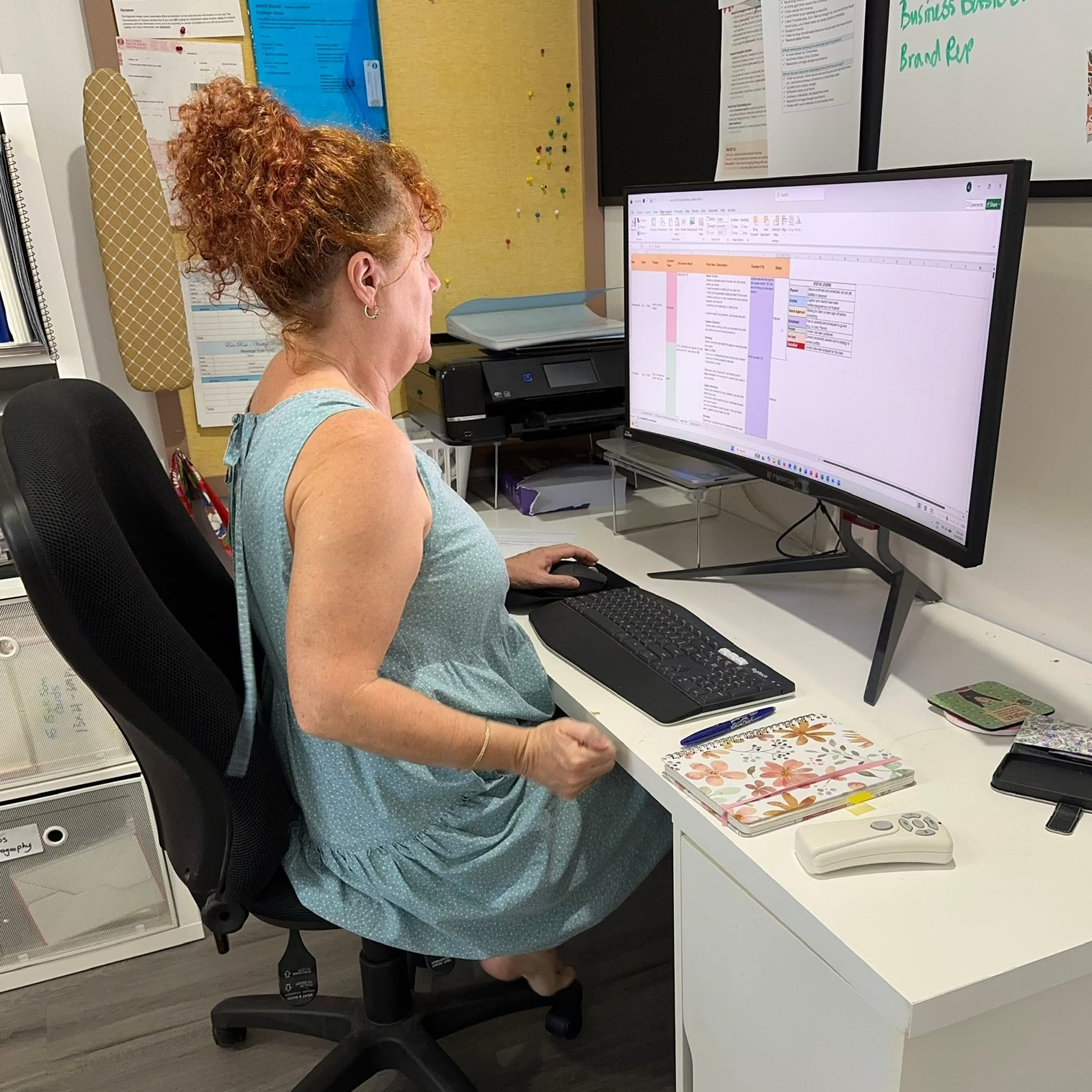 Amber at the computer for Evie Rose