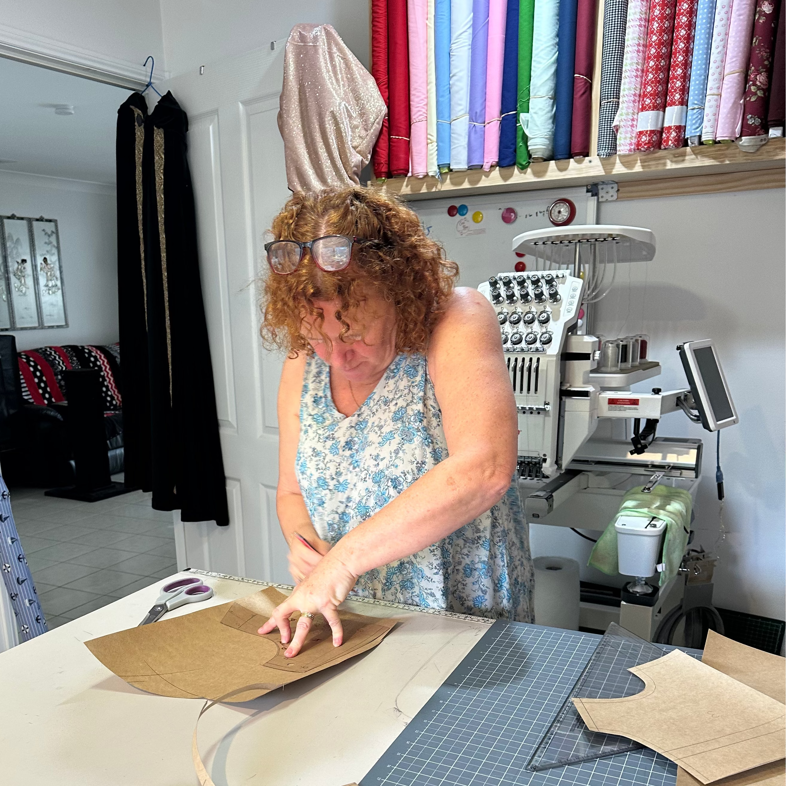 Amber making patterns in her sewing room Evie Rose