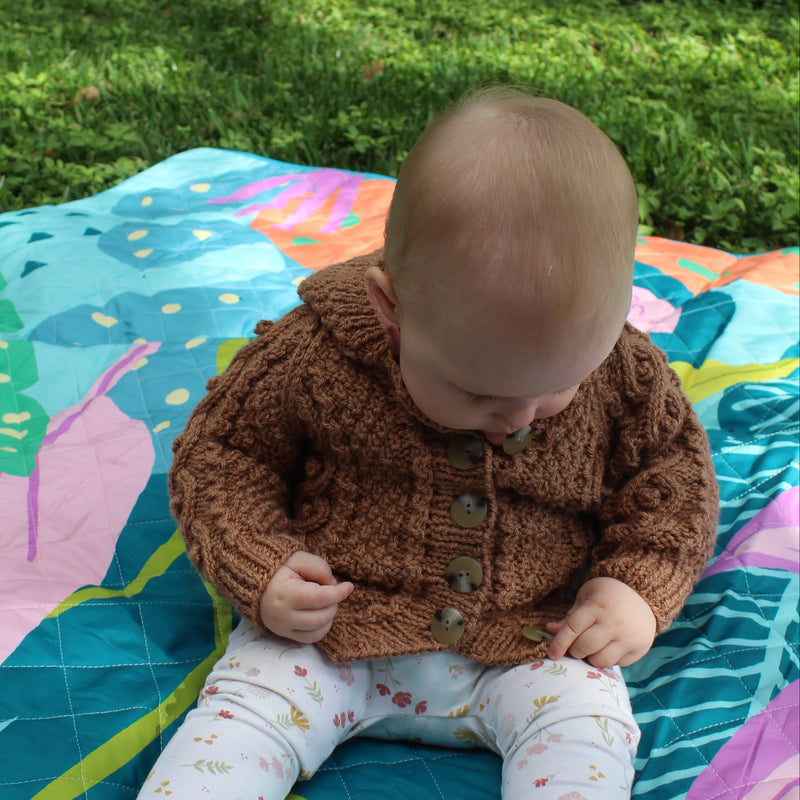 Hand Knitted Aran cardigan with collar