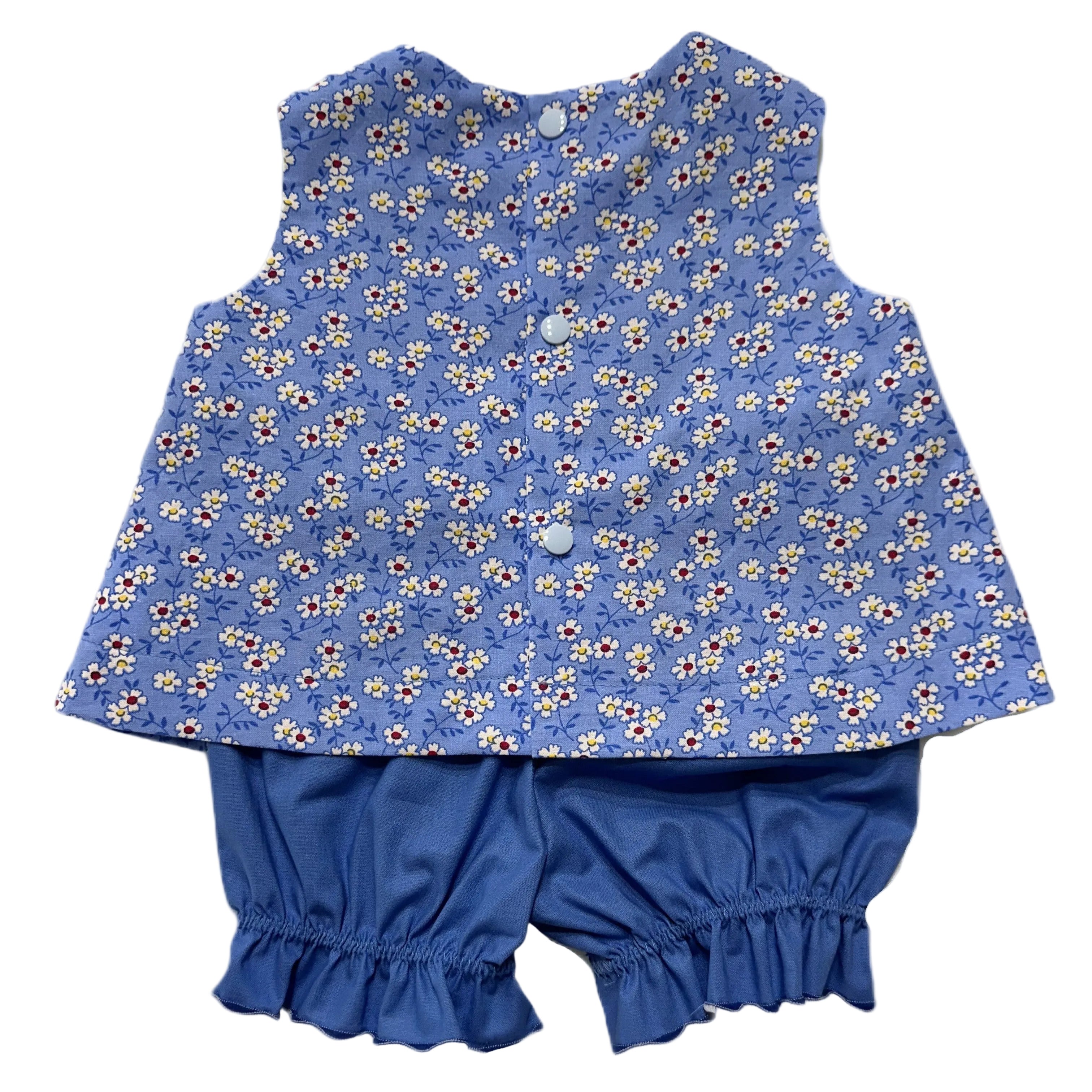 Blue floral sleeveless top and shorts set on a white background