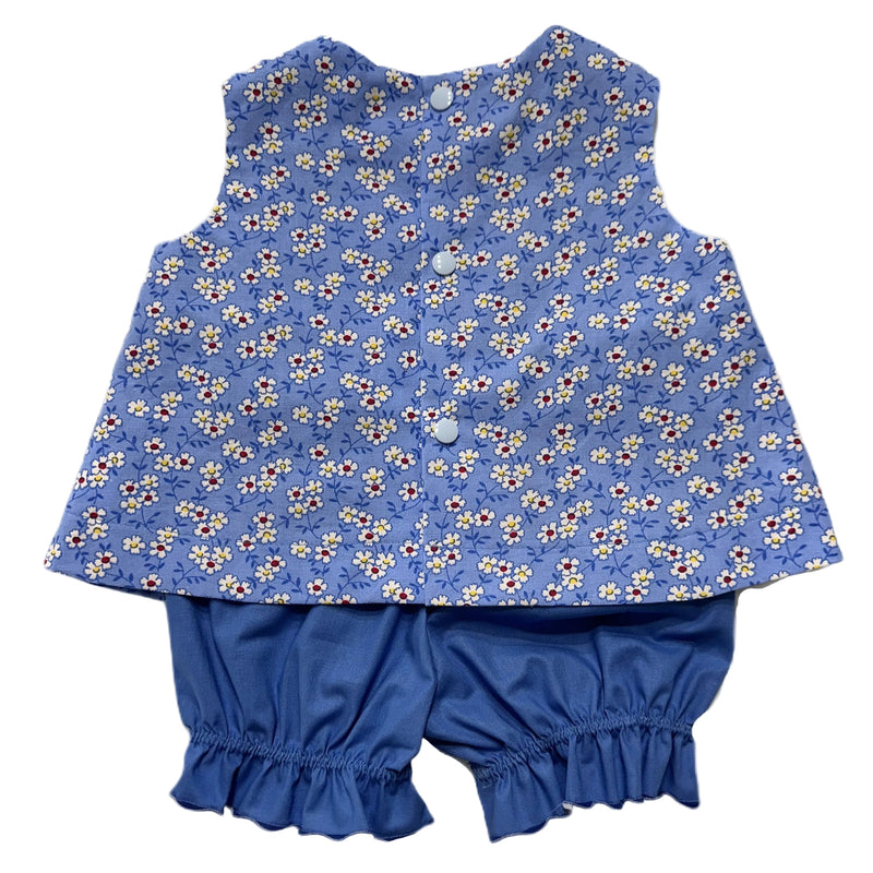 Blue floral sleeveless top and shorts set on a white background